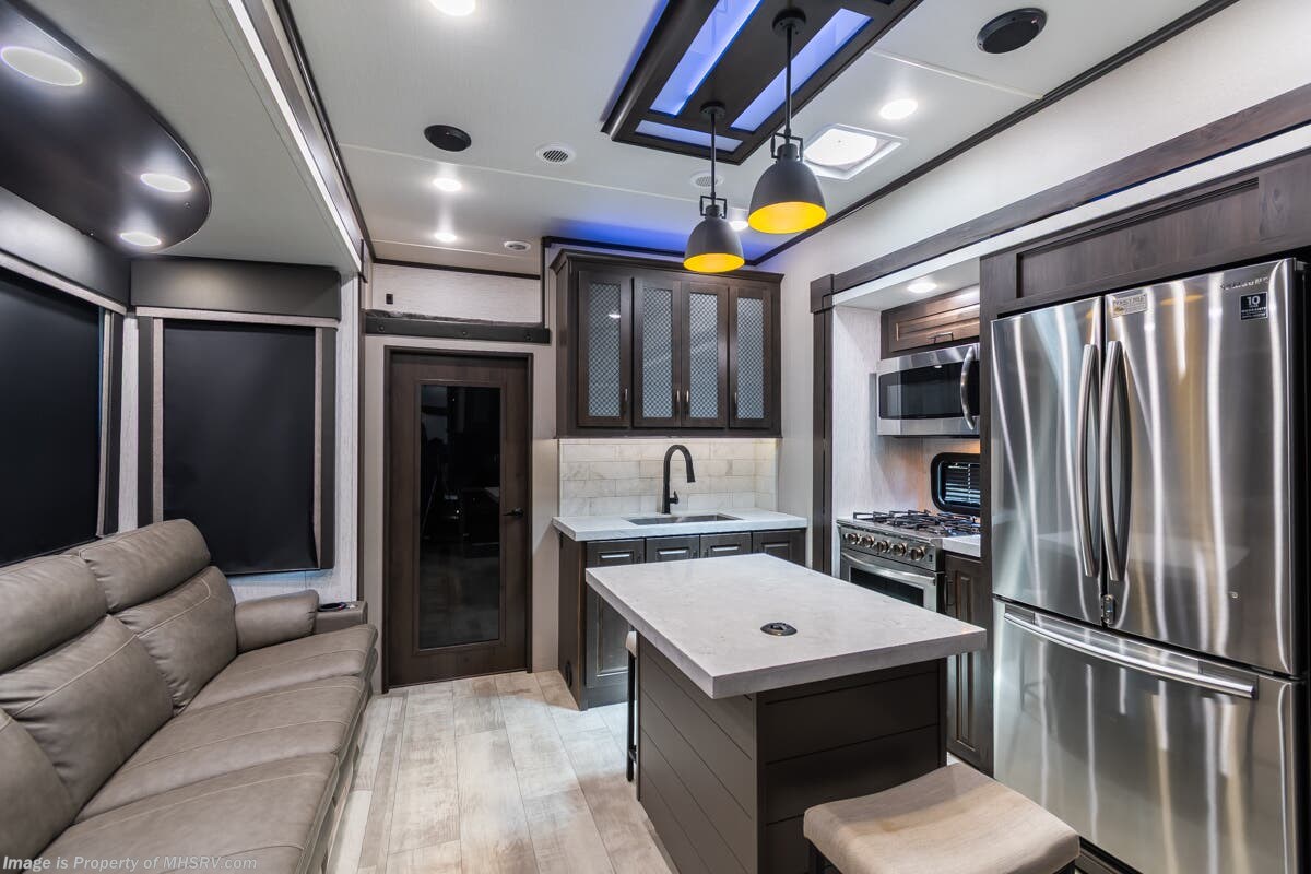 2021 Grand Design Momentum M-Class 398M - Used Fifth Wheel For Sale by Motor Home Specialist in Alvarado, Texas features Bath & 1/2, Bunk Beds, Theater Seating