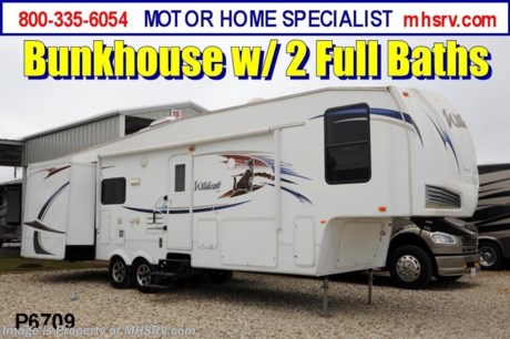 &lt;a href=&quot;http://www.mhsrv.com/5th-wheels/&quot;&gt;&lt;img src=&quot;http://www.mhsrv.com/images/sold-5thwheel.jpg&quot; width=&quot;383&quot; height=&quot;141&quot; border=&quot;0&quot; /&gt;&lt;/a&gt; Used Forest River RV /WA 4/1/13/ - 2011 Forest River Wildcat (313BH) is approximately 34 feet in length with 3 slides, bunk beds, and 2 full baths. This RV features a power patio awning, water heater, pass-thru storage, aluminum wheels, black tank rinsing system, water filtration system, exterior shower, roof ladder, CD/DVD player, AM/FM radio, 2 sofas, Jack Knife sleeper, queen Hide-A-Bed, booth converts to sleeper, computer desk, day/night shades, Fantastic Fan, microwave, 3 burner range with oven, solid surface kitchen counter, sink covers, queen size bed, ducted roof A/C and 2 LCD TVs. For complete details visit Motor Home Specialist at MHSRV .com or 800-335-6054.