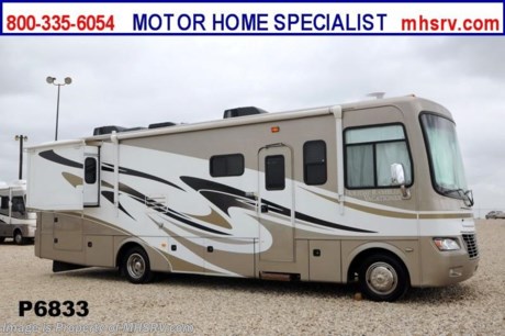 &lt;a href=&quot;http://www.mhsrv.com/holiday-rambler-rv/&quot;&gt;&lt;img src=&quot;http://www.mhsrv.com/images/sold-holidayrambler.jpg&quot; width=&quot;383&quot; height=&quot;141&quot; border=&quot;0&quot; /&gt;&lt;/a&gt; Used Holiday Rambler RV /TX 4/26/13/ - 2011 Holiday Rambler Vacationer (32WBD) Class A RV measures approximately 32 feet in length with ONLY 9,281 MILES! This RV features (2) slide-out rooms, a forward facing LCD TV and U-shaped booth,  painted exterior mask and skirt, Newport Cherry Glazed cabinets, power &amp; heated chrome side view mirrors, dual pane windows, heated holding tanks, blinker activated 3-camera vision system, refrigerator with ice maker, convection/microwave, DVD player in bedroom, LCD bedroom TV, day &amp; blackout shades, raised panel refrigerator doors, 50 amp service, 2nd auxiliary battery, 5500 Onan generator, exterior shower, electric patio awning, second roof A/C unit in bedroom &amp; kitchen Fantastic vent. The 2011 Holiday Rambler Vacationer also features a powerful Ford Triton V-10 engine with 362 HP, a peaked 1-piece fiberglass roof, hydraulic leveling jacks and much more. For additional information and photos please visit Motor Home Specialist at www.MHSRV.com or call 800-335-6054. 