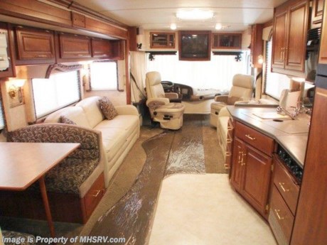 &lt;a href=&quot;http://www.mhsrv.com/other-rvs-for-sale/fleetwood-rvs/&quot;&gt;&lt;img src=&quot;http://www.mhsrv.com/images/sold-fleetwood.jpg&quot; width=&quot;383&quot; height=&quot;141&quot; border=&quot;0&quot; /&gt;&lt;/a&gt;
2003 Fleetwood Discovery 38&#39; with 2 slides, Caterpillar 330HP diesel engine, Allison 6 speed transmission, Freightliner chassis, air ride, air brakes with ABS, EMS, Onan 7.5 KW diesel generator, back-up camera, Power Gear leveling system, power leather seats, cruise control, tilt/telescoping wheel, cab fans, power mirrors with heat, AM/FM stereo with CD player, 2 TVs, DVD, VCR, surround sound, refrigerator with ice maker, washer/dryer combo, coffee maker, three burner stovetop, convection microwave, tile flooring, solid surface counters, day/night shades, dual pane glass, booth dinette, leather love seat, central vacuum, walk-thru bathroom with shower, private toilet, bedroom stereo, patio awning, Trac-Vision satellite system, air horns, spot light, aluminum wheels, hitch, ladder, dual ducted roof A/Cs, furnace, 50 amp service, non-smoker, no pets, ONLY 9K MILES and much more. 