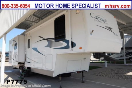 SOLD /TX 9/23/2013 Used Carriage RV for Sale- 2003 Carriage Cameo LXI (F32KS3) is approximately 33 feet in length 3 slides, patio awning, electric/gas water heater, 50 Amp service, front &amp; rear pass-thru storage, black tank rinsing system, exterior shower, roof ladder, sofa with sleeper, free standing table that extends, 2 Lazy Boy style recliners, day/night shades, Fantastic Vent, ceiling fan, microwave, 3 burner range with oven, sink covers, refrigerator, glass door shower and much more.