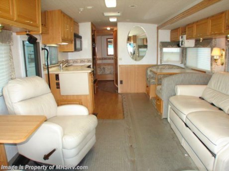 &lt;a href=&quot;http://www.mhsrv.com/other-rvs-for-sale/winnebago-rvs/&quot;&gt;&lt;img src=&quot;http://www.mhsrv.com/images/sold-winnebago.jpg&quot; width=&quot;383&quot; height=&quot;141&quot; border=&quot;0&quot; /&gt;&lt;/a&gt;
*JUST REDUCED* Pre-Owned Motor Home Sold 04/01/09 - Winnebago RVs - *Consignment Unit* 2002 Winnebago Adventurer 35&#39; W/ 2 Slides, model 35U. This RV comes equipped with a Vortec 8.1L engine on the 22-Series Workhorse chassis. Allison transmission, Onan 5.5K generator, HWH hydraulic coach levelers, Central A/C, FIBERGLASS ROOF, satellite, patio awning, rear vision monitor with audio, leather pilot &amp; co-pilot seats, cab fans, power windows, power remote mirrors with defrost, two TVs, VCR, 10-disc CD changer, sofa sleeper, leather recliner, booth dinette sleeper, dual pane windows, day/night shades, solid surface counters, wood flooring, refrigerator, convection/microwave, three burner range with oven, dual attic fans, side bath with shower, rear wardrobe closet, basement storage, rear hitch receiver, roof ladder, solar panel, 30 amp shore line, slide-out topper awnings, 10 gallon water heater, non-smoker, and 47K miles. 