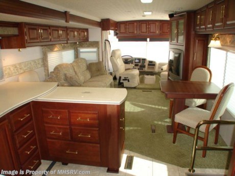 &lt;a href=&quot;http://www.mhsrv.com/other-rvs-for-sale/winnebago-rvs/&quot;&gt;&lt;img src=&quot;http://www.mhsrv.com/images/sold-winnebago.jpg&quot; width=&quot;383&quot; height=&quot;141&quot; border=&quot;0&quot; /&gt;&lt;/a&gt;
Pre-Owned Motor Home Priced Below N.A.D.A. Guide&#39;s Low Wholesale or Trade-In Value (N.A.D.A. Low Retail = $79,810) (Low Wholesale = $62,300) OUR PRICE ONLY $61,999. 2004 Winnebago Chieftain 39&#39; W/2 slides, model 39T, 8.1L Chevrolet engine, Workhorse 22 series chassis, 2K watt inverter, Onan 7KW generator, HWH hydraulic leveling jacks, solar back-up camera with audio, cruise control, tilt wheel, power visors, cab fans, power mirrors, Sony 10 disc CD changer, power door locks, power window, leather seats, two TVs, Surround sound system, DVD, VCR, convection/microwave, gas stovetop, central vacuum, gas/electric water heater, 4-door refrigerator with ice maker, private toilet, EMS, dual pane glass, day/night shades, dinette table and chairs, power sofa sleeper, Euro chair with computer desk, 7&#39; ceilings, fantastic fans, solid surface counters, queen Select Comfort mattress, power patio awning, 50 amp service, roof ladder, power entrance steps, aluminum wheels, drivers door, docking lights, exterior shower, exterior stereo and speakers, fiberglass roof, solar panel air horns, keyless entry remote, slide out awning toppers, satellite system Central ducted A/C with heat pump, non smoker, only 3K miles and much more. 