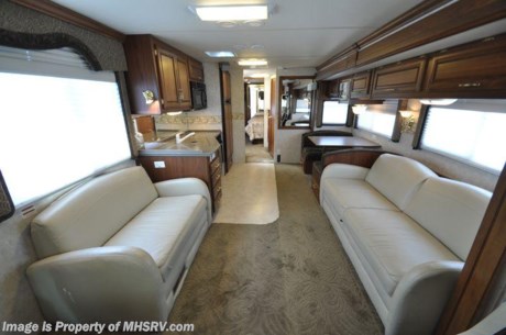 &lt;a href=&quot;http://www.mhsrv.com/other-rvs-for-sale/fleetwood-rvs/&quot;&gt;&lt;img src=&quot;http://www.mhsrv.com/images/sold-fleetwood.jpg&quot; width=&quot;383&quot; height=&quot;141&quot; border=&quot;0&quot; /&gt;&lt;/a&gt;
2003 Fleetwood Discovery 38&#39; with two slides, model 38U, Caterpillar 330 hp diesel engine, Allison 6 speed transmission, Freightliner chassis, Freedom 2000 watt inverter, Onan 7.5 quiet diesel generator, Power Gear leveling system, backup camera with audio, air brakes, cruise control, tilt/telescoping wheel, power visors, cab fans, power mirrors with heat, six way power leather seats with heat, two TVs, Panasonic surround sound with DVD player, VCR, convection/microwave, gas stove top with oven, 4-door refrigerator with ice maker, gas/electric water heater, washer dryer combo, private toilet, E.M.S., dual pane glass, day/night shades, booth dinette sleeper, leather sofa sleeper, leather love seat, soft touch vinyl ceilings, solid surface countertops, queen bed, AM/FM stereo with CD player in bedroom, patio awning, 50 amp service, roof ladder, powerr entrance steps, aluminum wheels, gravel shield, spotlight, exterior shower, solar panel, air horns, slide out awning toppers, KVH Trac-Vision satellite system, dual ducted roof A/C&#39;s, 34K miles and much more.