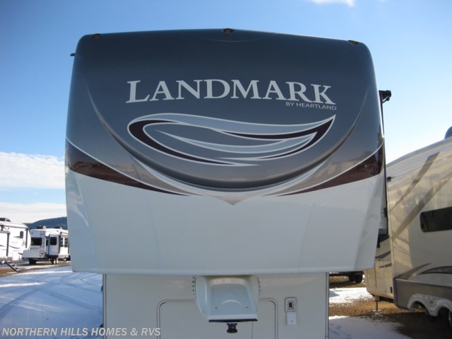 2012 Heartland Landmark LM Grand Canyon - Used Fifth Wheel For Sale by Northern Hills Homes and RV&#39;s in Whitewood, South Dakota features Ladder, Free Standing Dinette w/Chairs, Slideout, Central Vacuum, Awning