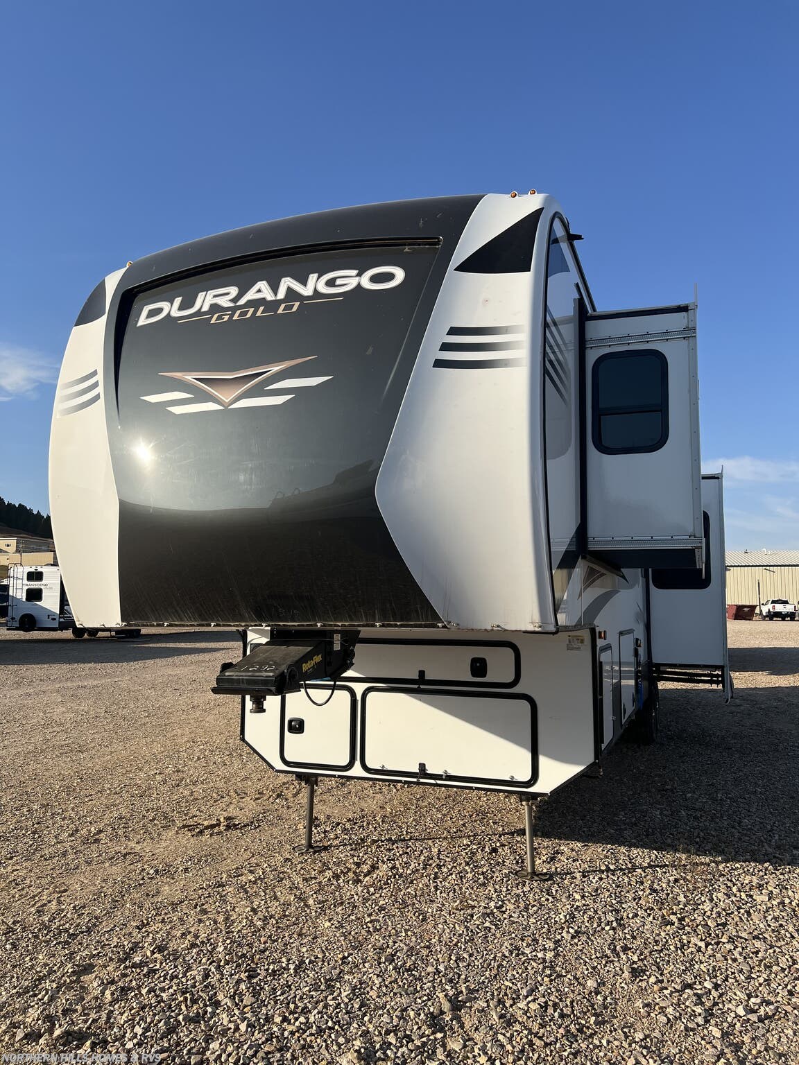 2022 K-Z Durango Gold G391RKF - Used Fifth Wheel For Sale by Northern Hills Homes and RV's in Whitewood, South Dakota features Second Roof A/C, Spare Tire Kit, Exterior Speakers, Fireplace, LP Detector