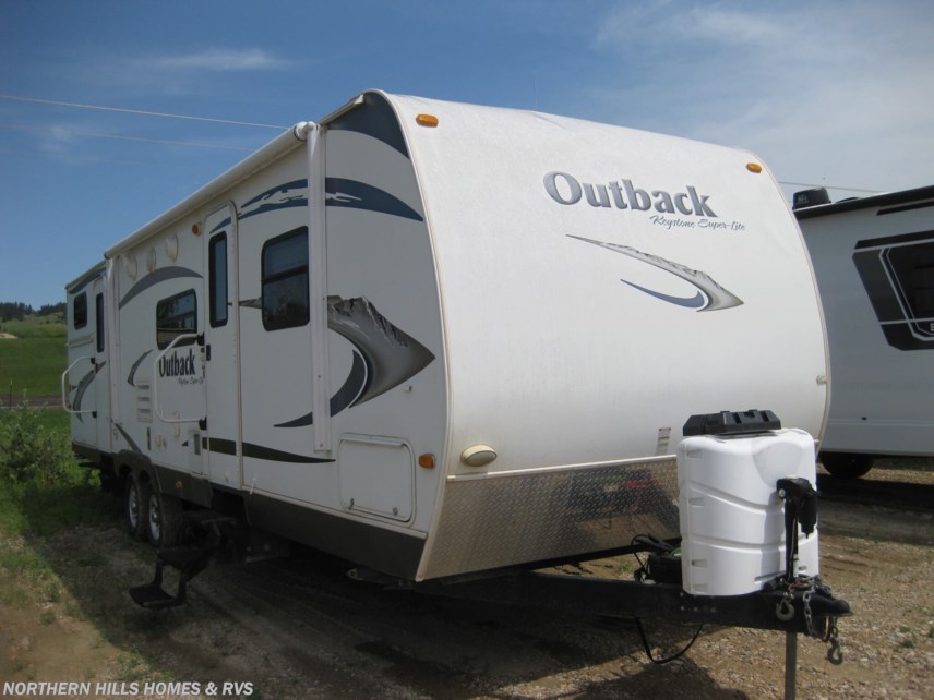 Used 2011 Keystone Outback 312BH available in Whitewood, South Dakota