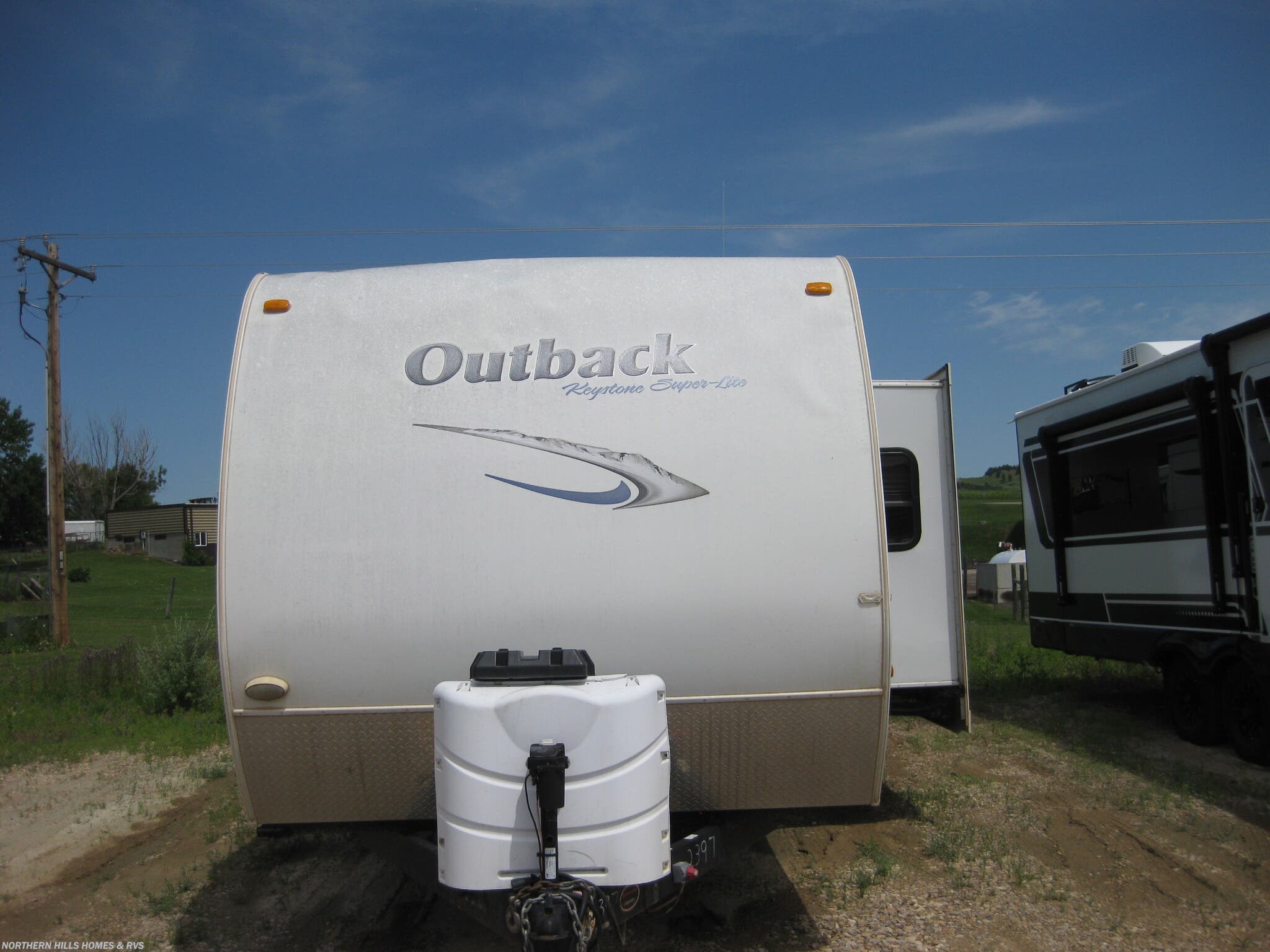 2011 Outback 312BH by Keystone from Northern Hills Homes and RV's in Whitewood, South Dakota