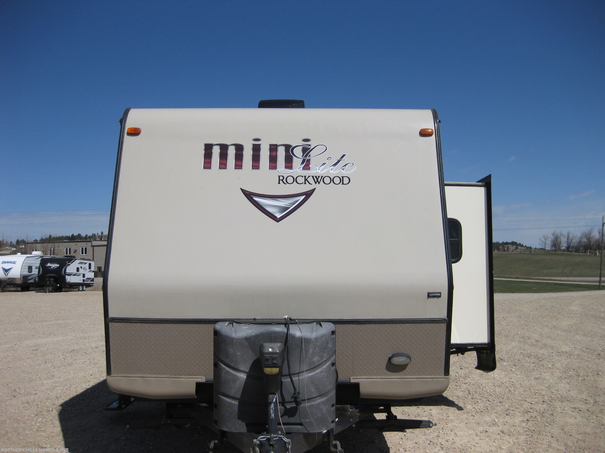 2016 Forest River Rockwood Mini Lite 2104S - Used Travel Trailer For Sale by Northern Hills Homes and RV's in Whitewood, South Dakota features Slideout, Stove, LP Detector, Awning, Microwave