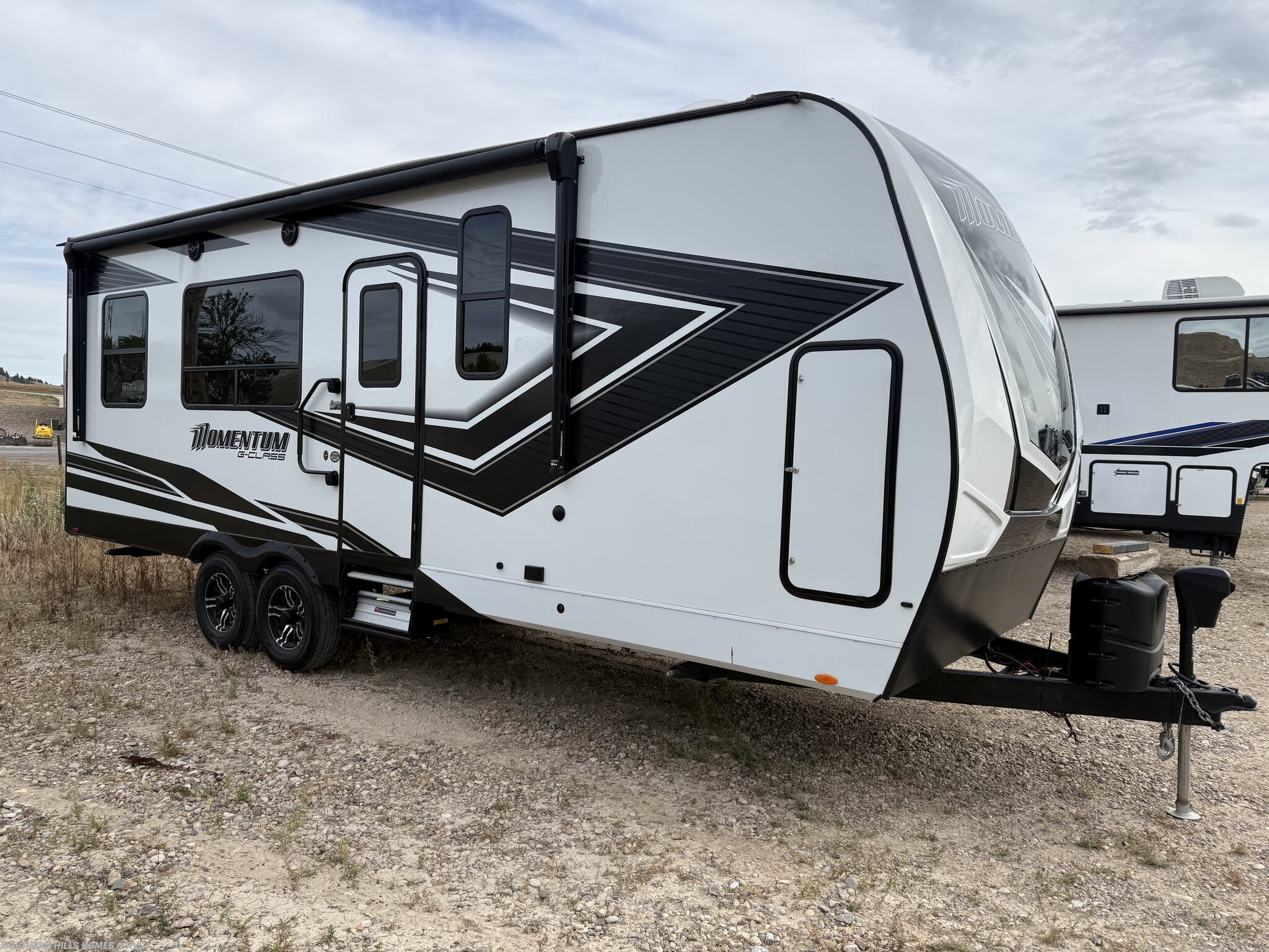 2022 Grand Design Momentum G-Class 23G - Used Toy Hauler For Sale by Northern Hills Homes and RV's in Whitewood, South Dakota features Slideout, Alloy Wheels, Oven, Refrigerator, Solar Panel