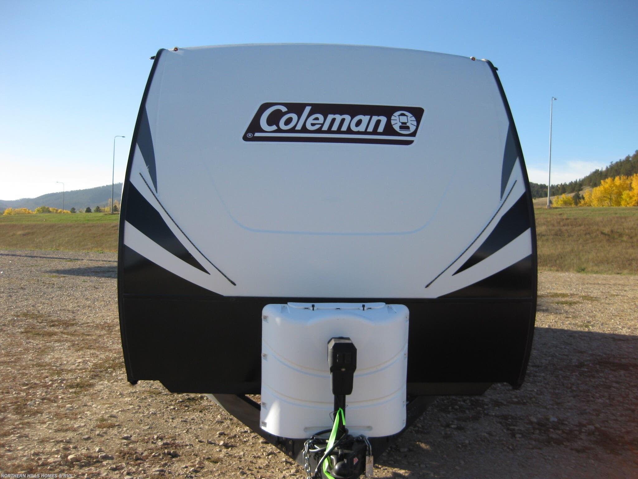 2021 Dutchmen Coleman Light 2715RL - Used Travel Trailer For Sale by Northern Hills Homes and RV's in Whitewood, South Dakota features Oven, Power Awning, Slideout, LP Detector, Air Conditioning