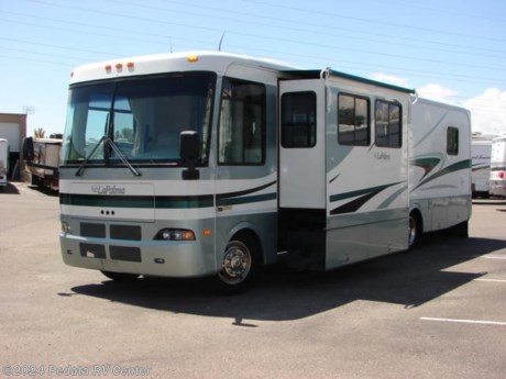 &lt;p&gt;This 2003 Monaco La Palma is a beautiful class A gas coach with a lot of unexpected upgrades.&amp;nbsp; Features include:&amp;nbsp;convection microwave oven,&amp;nbsp;large pantry,&amp;nbsp;Corian counter tops,&amp;nbsp;fantastic fan,&amp;nbsp;thermal pane windows,&amp;nbsp;mid-coach built in entertainment center,&amp;nbsp;DVD,&amp;nbsp;VCR,&amp;nbsp;sleeper sofa, and an&amp;nbsp;encased patio awning.&lt;/p&gt;

&lt;p&gt;For complete information call us toll free at 888-545-8314.&lt;/p&gt;
