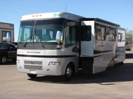 &lt;p&gt;&amp;nbsp;&lt;/p&gt;

&lt;p&gt;This 2005 Holiday Rambler Vacationer is completely loaded with everything that you might want in a gas coach, in fact the only thing that this coach doesn’t have is a diesel engine.&amp;nbsp; Features include: four door refrigerator with ice, solid surface counter tops, convection microwave oven, kitchen skylight, fantastic fan, power awning, alloy wheels, three way back up camera, fully automatic leveling system, thermal pane windows, grade brake, built in desk, exterior stereo, and a satellite dish. For complete information call us toll free at 888-545-8314.&lt;/p&gt;
