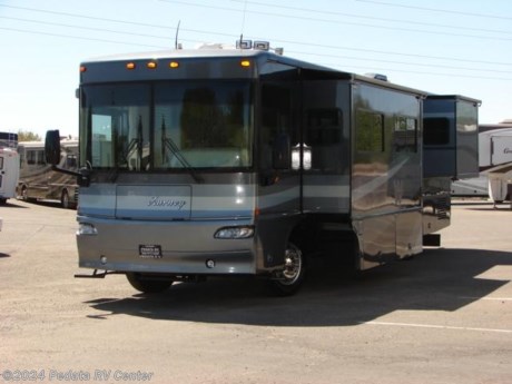 &lt;p&gt;&amp;nbsp;&lt;/p&gt;

&lt;p&gt;This 2005 Winnebago Journey feature very low miles and plenty of power.&amp;nbsp; Other feature include: Sleep Number bed, built in washer/dryer, TV, DVD, VCR, 5.1 surround sound, satellite dish, large pantry, oven, convection microwave oven, solid surface counter tops, smart wheel, and a power awning. For complete information call us toll free at 888-545-8314.&lt;/p&gt;
