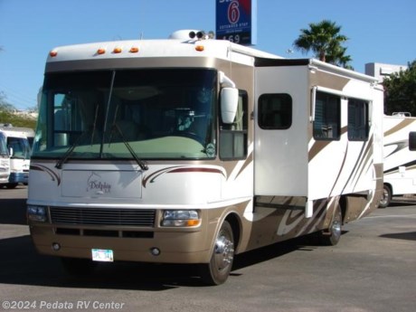 &lt;p&gt;&amp;nbsp;&lt;/p&gt;

&lt;p&gt;This 2005 National Dolphin LX is a beautiful class A coach with some wonderful finish and lots of extras.&amp;nbsp; Features include: TV, DVD, VCR, Satellite dish, solid surface counter tops, large four door refrigerator, fantastic fan, ducted A/C, power seats, back-up monitor, power visors, and an encased patio awning. For complete information call us toll free at 888-545-8314.&lt;/p&gt;
