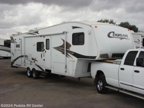 &lt;p&gt;&amp;nbsp;&lt;/p&gt;

&lt;p&gt;This 2008 Keystone Cougar is a wonderful and lightweight 5&lt;sup&gt;th&lt;/sup&gt; wheel toy hauler.&amp;nbsp; Features include TV, DVD, stereo, built-in generator, glass shower, day-night shades, bunk beds, polar package, and access to basement storage from the inside. For complete information call us toll free at 888-545-8314.&lt;/p&gt;

