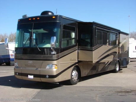 &lt;p&gt;&amp;nbsp;&lt;/p&gt;

&lt;p&gt;This 2005 Thor Mandalay is a beautiful diesel pusher with some wonderful features and excellent finish.&amp;nbsp; Features include: TV, VCR, satellite dish, ceramic tile floors, sleep number bed, smart wheel, alloy wheels, power awning, power cord reel, encased window awnings, solid surface counter tops, convection microwave oven, large refrigerator, central vacuum, slide out storage trays, and an exterior entertainment center with a TV. For complete information call us toll free at 888-545-8314.&lt;/p&gt;
