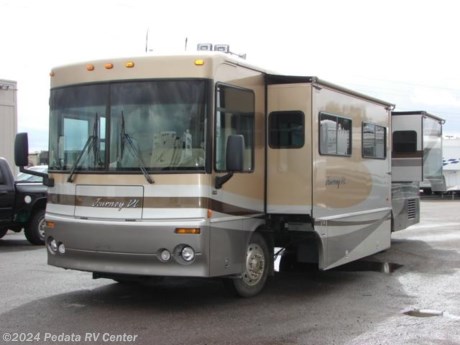 &lt;p&gt;This 2003 Winnebago Journey DL is a wonderful diesel pusher with two slides and some great features.&amp;nbsp; Features include: built-in coffee maker, back-up camera, glass shower, built-in washer/dryer, exterior stereo, TV, VCR, surround sound, satellite dish, power awning, alloy wheels, solid surface counter tops, convection microwave oven, icemaker, large pantry, ceramic tile floors, and two bathroom sinks. For complete information call us toll free at 888-545-8314.&lt;/p&gt;
