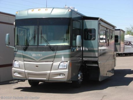 &lt;p&gt;&amp;nbsp;&lt;/p&gt;

&lt;p&gt;This 2004 Winnebago Vectra is a gorgeous diesel pusher with some very nice features for your next trip.&amp;nbsp; Features include: power awning, alloy wheels, central vacuum, power visors, smart wheel, solid surface counter tops, wrap around kitchen, large four door refrigerator, pull out pantry, built-in washer/dryer, exterior stereo, TV, DVD, VCR, satellite dish, power water hose, power cord reel. For complete information call us toll free at 888-545-8314.&lt;/p&gt;
