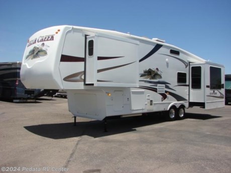 &lt;p&gt;&amp;nbsp;&lt;/p&gt;

&lt;p&gt;This 2007 Forest River Cedar Creek is a beautiful fifth wheel with lots of extras to give you all the comforts of home.&amp;nbsp; Features include: fireplace, TV, DVD, 5.1 surround sound, day-night shades, ceiling fan, fantastic fan with rain sensor, patio awning, alloy wheels, solid surface counter tops, microwave oven, and central vacuum. For complete information call us toll free at 888-545-8314.&lt;/p&gt;
