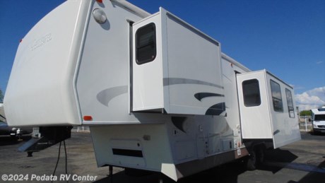 This is a super clean pre-owned fifth wheel that even has a generator! Call 866-733-2829 for a complete list of options. 