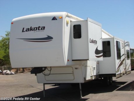 &lt;p&gt;&amp;nbsp;&lt;/p&gt;

&lt;p&gt;This 2006 Monaco McKenzie Lakota is a beautiful fifth wheel with some very nice features to give you all the comforts of home.&amp;nbsp; Features include: large pull out pantry, spacious kitchen, two recliners, king bed, ducted A/C, alloy wheels, ceiling fan, TV, DVD, and fireplace. For complete information call us toll free at 888-545-8314.&lt;/p&gt;
