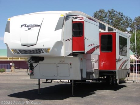 &lt;p&gt;&amp;nbsp;&lt;/p&gt;

&lt;p&gt;This 2008 Keystone Fuzion is a great fifth wheel toy hauler with all the comforts of home and plenty of room for all your friends and family.&amp;nbsp; Features include: alloy wheels, power patio awning, large shower, wrap around kitchen, refrigerator, microwave, stove, oven, ceiling fan, ducted A/C, fuel pump station, and a built-in Onan 5500. For complete information call us toll free at 888-545-8314.&lt;/p&gt;
