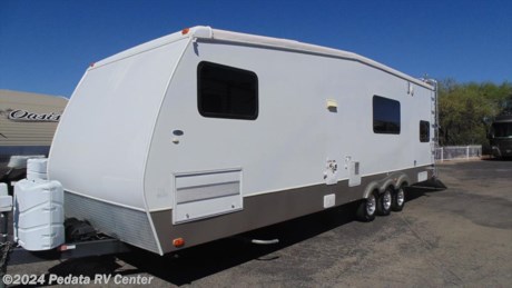 Great buy on a clean pre-owned Toy Hauler! Call 866-733-2829 for a complete list of options. Hurry it&#39;s Dune season! 