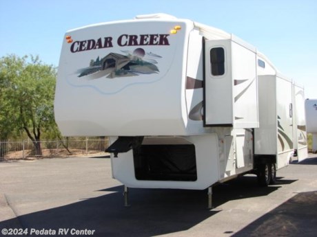 &lt;p&gt;This 2007 Forest River Cedar Creek is a very nice fifth wheel with all the comforts of home.&amp;nbsp; Features include: TV, DVD, 5.1 surround sound, built-in fireplace, washer/dryer prep, stove, microwave, refrigerator, pantry, central vacuum, alloy wheels, fantastic fan, day-night shades, ceiling fan, and a patio awning. For complete information call us toll free at 888-545-8314.&lt;/p&gt;
