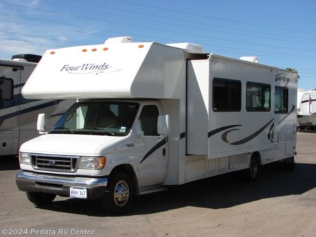 &lt;p&gt;&amp;nbsp;&lt;/p&gt;

&lt;p&gt;This 2003 Four Winds is a very nice class C with some extra amenities you generally don’t see in a class C.&amp;nbsp; Features include: pass through exterior storage, fantastic fan, day-night shades, heated and remote mirrors, patio awning, exterior shower, pantry, microwave oven, two LCD TVs, and leveling jacks. For complete information call us toll free at 888-545-8314.&lt;/p&gt;
