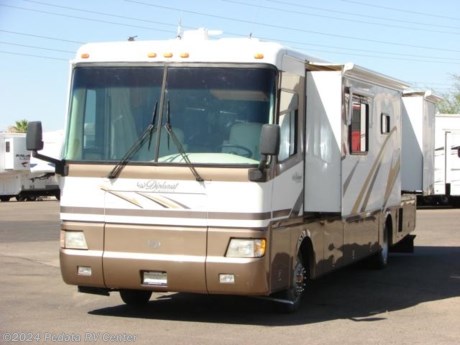 &lt;p&gt;&amp;nbsp;&lt;/p&gt;

&lt;p&gt;This 2000 Monaco Diplomat is a beautiful coach with some very nice features all at a very low price.&amp;nbsp; Features include: ceramic tile floors, solid surface counter tops, large four-door refrigerator with ice, convection microwave oven, built in washer/dryer, alloy wheels, large glass shower, power inverter, TV, satellite dish, dinette with computer prep, and lots of storage throughout. For complete information call us toll free at 888-545-8314.&lt;/p&gt;
