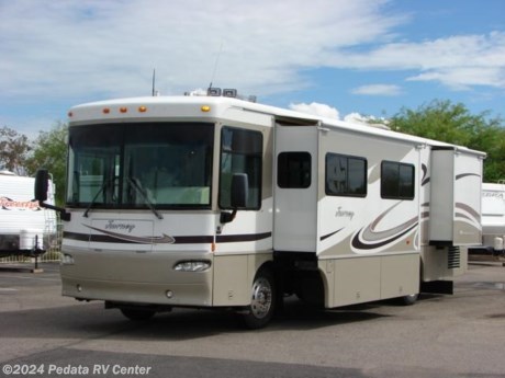 &lt;p&gt;&amp;nbsp;&lt;/p&gt;

&lt;p&gt;This 2004 Winnebago Journey is a beautiful short diesel pusher with some very nice features in a relatively small package.&amp;nbsp; Features include: TV, DVD, VCR, satellite dish, 5.1 surround sound, 10 disc CD changer, power sofa, power visors, exterior stereo, built-in washer/dryer, large four door refrigerator, large pantry, solid surface counter tops, convection microwave oven, ceiling fan, and alloy wheels. For complete information call us toll free at 888-545-8314.&lt;/p&gt;
