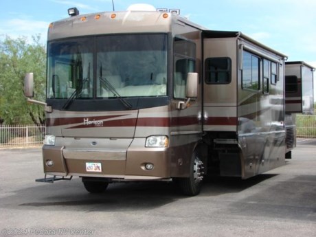 &lt;p&gt;&amp;nbsp;&lt;/p&gt;

&lt;p&gt;This 2004 Itasca Horizon is a beautiful class A diesel pusher with some very nice appointments to make your next trip very comfortable.&amp;nbsp; Features include: TV, DVD, VCR, 5.1 surround sound, satellite dish, ultra leather, side mount radiator, smart wheel, fantastic fan, power awning, alloy wheels, large four door refrigerator, pull out pantry, wrap around kitchen, Advantium microwave, and central vacuum. For complete information call us toll free at 888-545-8314.&lt;/p&gt;
