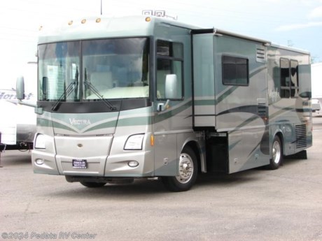 &lt;p&gt;&amp;nbsp;&lt;/p&gt;

&lt;p&gt;This 2004 Winnebago Vectra is a wonderful and short little diesel pusher that is a lot of power in a small package.&amp;nbsp; Features include: smart wheel, power awning, power sofa, sleep number bed, slide-out storage tray, serious satellite dish, day-night shades, solid surface counter tops, large pull-out pantry, refrigerator, ice-maker, and washer/dryer prep. For complete information call us toll free at 888-545-8314.&lt;/p&gt;

