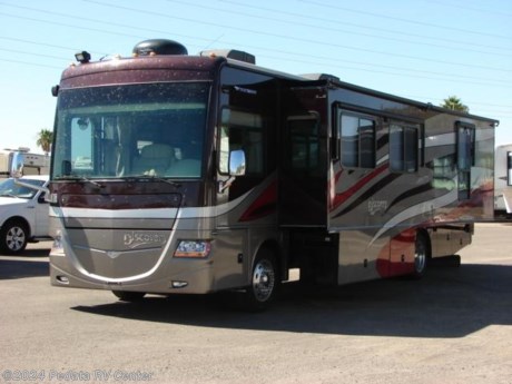 &lt;p&gt;&amp;nbsp;&lt;/p&gt;

&lt;p&gt;This 2008 Fleetwood Discovery is fully loaded with options and wide-open floor plan.&amp;nbsp; Features include: TV, DVD, satellite dish, pull-out wrap around counter, solid surface counter tops, large four door refrigerator with ice maker, fantastic fan, fully automatic leveling jacks, power awning, alloy wheels, 3-way back up camera, convection microwave oven, central vacuum, built-in washer/dryer, sleep number bed, ultra leather, power sun visors, and an exterior entertainment center with TV. For complete information call us toll free at 888-545-8314.&lt;/p&gt;
