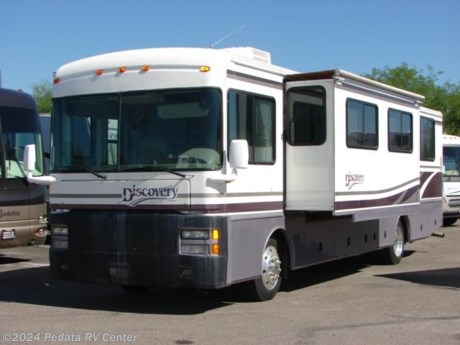 &lt;p&gt;&amp;nbsp;&lt;/p&gt;

&lt;p&gt;This 1999 Fleetwood Discovery is a great RV at an amazing price providing a lot of power for a few dollars.&amp;nbsp; Features include: large glass shower, encased patio awning, leveling jacks, alloy wheels, power inverter, built-in washer/dryer, exterior refrigerator/freezer on a slide-out tray, TV, VCR, satellite dish, large refrigerator with ice, solid surface counter tops, convection microwave oven, and a fantastic fan. For complete information call us toll free at 888-545-8314.&lt;/p&gt;

