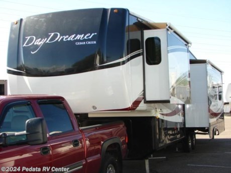 &lt;p&gt;&amp;nbsp;&lt;/p&gt;

&lt;p&gt;This 2010 Cedar Creek Day Dreamer is an absolute dream with every bell, whistle, and luxury that you could want.&amp;nbsp; Features include:&amp;nbsp; recessed lighting throughout, powered hidden LCD TV, DVD, 5.1 surround sound, satellite dish, fireplace, king bed, large refrigerator with ice maker, power patio awning, alloy wheels, built in generator with large fuel tank, remote power jacks and stabilizers, and full body paint. For complete information call us toll free at 888-545-8314.&lt;/p&gt;
