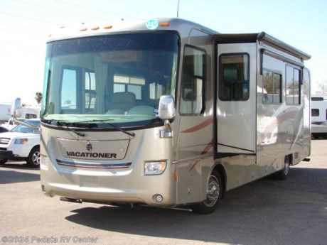 &lt;p&gt;&amp;nbsp;&lt;/p&gt;

&lt;p&gt;This 2008 Holiday Rambler Vacationer is a beautiful class A diesel pusher with all the quality that you expect from a Holiday Rambler RV.&amp;nbsp; Features include: TV, DVD, 5.1 surround sound, satellite radio, fully automatic leveling jacks, power visors, 3-way back-up camera, comfortable leather booth, sleeper sofa, recessed lighting, power patio awning, one piece windshield, solid surface counter tops, large four door refrigerator with ice, convection microwave oven, power inverter, and central vacuum. For complete information call us toll free at 888-545-8314.&lt;/p&gt;
