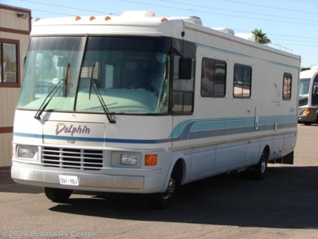 &lt;p&gt;&amp;nbsp;&lt;/p&gt;

&lt;p&gt;This 1995 National Dolphin is a steal of a deal, loaded with some great features and all for a very affordable price. Features include: ducted A/C, solid surface counter tops, microwave oven, large refrigerator with ice, day-night shades, power inverter, TV, DVD, VCR, 10 disc CD changer, and leveling jacks. For complete information call us toll free at 888-545-8314.&lt;/p&gt;
