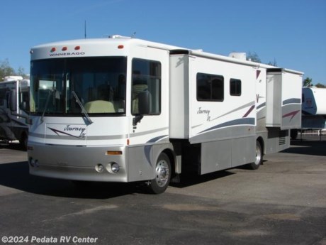 &lt;p&gt;&amp;nbsp;&lt;/p&gt;

&lt;p&gt;This 2001 Winnebago Journey DL is an absolutely beautiful diesel pusher for an amazing price.&amp;nbsp; Features include: TV, VCR, satellite dish, alloy wheels, encased patio awning, exterior stereo, thermal pane windows, built-in blow dryer, large pull out pantry, refrigerator with ice, convection microwave oven, solid surface counter tops, and a built-in coffee maker. For complete information call us toll free at 888-545-8314.&lt;/p&gt;

