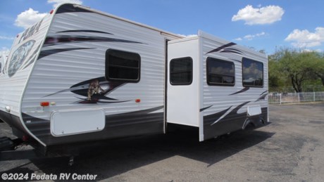 This one is ready to camp! Has outside kitchen complete with grill, microwave,&amp;nbsp; fridge and more! Call 866-733-2829 Today! 