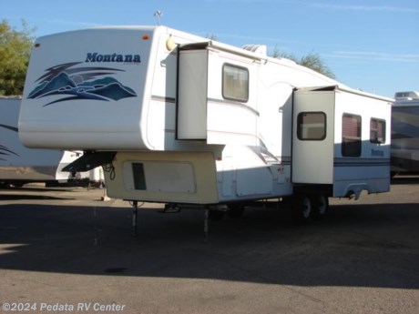 &lt;p&gt;&amp;nbsp;&lt;/p&gt;

&lt;p&gt;&amp;nbsp;&lt;/p&gt;

&lt;p&gt;This 2000 Keystone Montana is a beautiful fifth wheel with some nice extras for your comfort.&amp;nbsp; Features include: TV, stereo, satellite dish, built in generator, patio awing, ceiling fan, ducted A/C, day-night shades, wrap around kitchen, microwave oven, refrigerator and large pantry. For complete information call us toll free at 888-545-8314.&lt;/p&gt;
