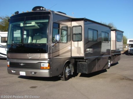 &lt;p&gt;&amp;nbsp;&lt;/p&gt;

&lt;p&gt;This 2005 Fleetwood Discovery is a beautiful diesel pusher with some very gorgeous features without the high price tag to go with it.&amp;nbsp; Features include: wrap around kitchen, solid surface counter tops, convection microwave oven, built in coffee maker, large four door refrigerator with ice, central vacuum, built in washer/dryer, power visors, fully automatic leveling jacks, TV, DVD, VCR, 5.1 surround sound, satellite dish, satellite radio, ultra leather opposing couches, and an external entertainment center with a pull out TV. For complete information call us toll free at 888-545-8314.&lt;/p&gt;
