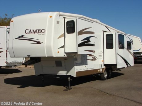 &lt;p&gt;&amp;nbsp;&lt;/p&gt;

&lt;p&gt;This 2007 Carriage Cameo fifth wheel is a beautiful RV with all the extras to make sure that you feel at home in style and comfort.&amp;nbsp; Features include: solid surface counter tops, microwave oven, large four door refrigerator, central vacuum, built-in washer/dryer, ceiling fan, TV, DVD, 5.1 surround sound, fireplace, built-in desk, sleeper sofa, alloy wheels, and power patio awning. &amp;nbsp;For complete information call us toll free at 888-545-8314.&lt;/p&gt;
