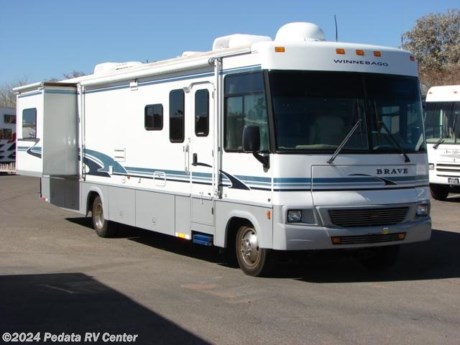 &lt;p&gt;&amp;nbsp;&lt;/p&gt;

&lt;p&gt;This 2003 Winnebago Brave is a nice class A gas RV with some nice features for your next trip.&amp;nbsp; Features include: leveling jacks, TV, VCR, satellite dish, power inverter, solid surface counter tops, large pantry, built-in coffee maker, fantastic fan, built-in washer/dryer, large glass shower, and a patio awning. For complete information call us toll free at 888-545-8314.&lt;/p&gt;
