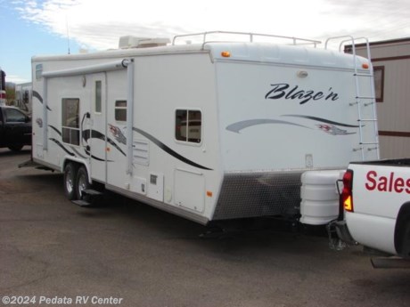 &lt;p&gt;&amp;nbsp;&lt;/p&gt;

&lt;p&gt;This 2004 Blaze’N is a great toy hauler with everything that you need for your next trip and all of it for a great price.&amp;nbsp; Features include: built-in generator, encased power patio awning, alloy wheels, power hitch jack, fuel pump station, CD, stereo, fantastic fan, and a front bedroom. For complete information call us toll free at 888-545-8314.&lt;/p&gt;
