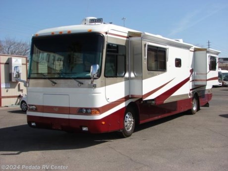 &lt;p&gt;&amp;nbsp;&lt;/p&gt;

&lt;p&gt;This 2000 Monaco Dynasty is a beautiful high-end diesel pusher with all the luxury and class that you need to take your next excursion in style.&amp;nbsp; Features include: smart wheel, fantastic fan, encased patio awning, LCD TV, DVD, VCR, surround sound, satellite dish, alloy wheels, solid wood cabinets, ceramic tile floors, solid surface counter tops, convection microwave oven, large four door refrigerator with ice, and a large glass shower. For complete information call us toll free at 888-545-8314.&lt;/p&gt;
