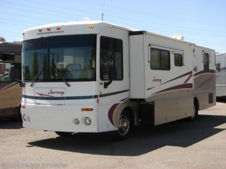 &lt;p&gt;&amp;nbsp;&lt;/p&gt;

&lt;p&gt;This 2000 Winnebago Journey is a beautiful diesel pusher for an amazing low price.&amp;nbsp; Features include: exhaust brake, encased patio awning, encased window awnings, fantastic fan, lots of storage, solid surface counter tops, washer/dryer prep, microwave oven, built-in coffee maker, TV, VCR, satellite dish, and a LCD TV with DVD player in the bedroom. For complete information call us toll free at 888-545-8314.&lt;/p&gt;
