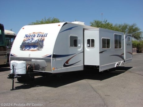 &lt;p&gt;&amp;nbsp;&lt;/p&gt;

&lt;p&gt;This 2011 Heartland North Trail is a beautiful travel trailer with just about everything that you could want.&amp;nbsp; Features include: outside kitchen and entertainment center, power patio awning, exterior speakers, power stabilizer jacks, alloy wheels, exterior shower, LCD TV, and a built in stereo. For complete information call us toll free at 888-545-8314.&lt;/p&gt;

&lt;p&gt;&amp;nbsp;&lt;/p&gt;
