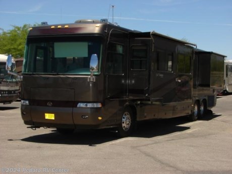 &lt;p&gt;&amp;nbsp;&lt;/p&gt;

&lt;p&gt;&amp;nbsp;&lt;/p&gt;

&lt;p&gt;This 2003 Monaco Signature is a gorgeous high-end diesel pusher with all the luxurious features you could want.&amp;nbsp; Features include: solid surface counter tops, recessed lighting, solid wood cabinets throughout, LCD TV, DVD, VCR, satellite, ultra leather, power visors, Smartwheel, power pedals, color back-up monitor, day-night shades, built-in washer/dryer, and Aqua Hot. For complete information call us toll free at 888-545-8314.&lt;/p&gt;
